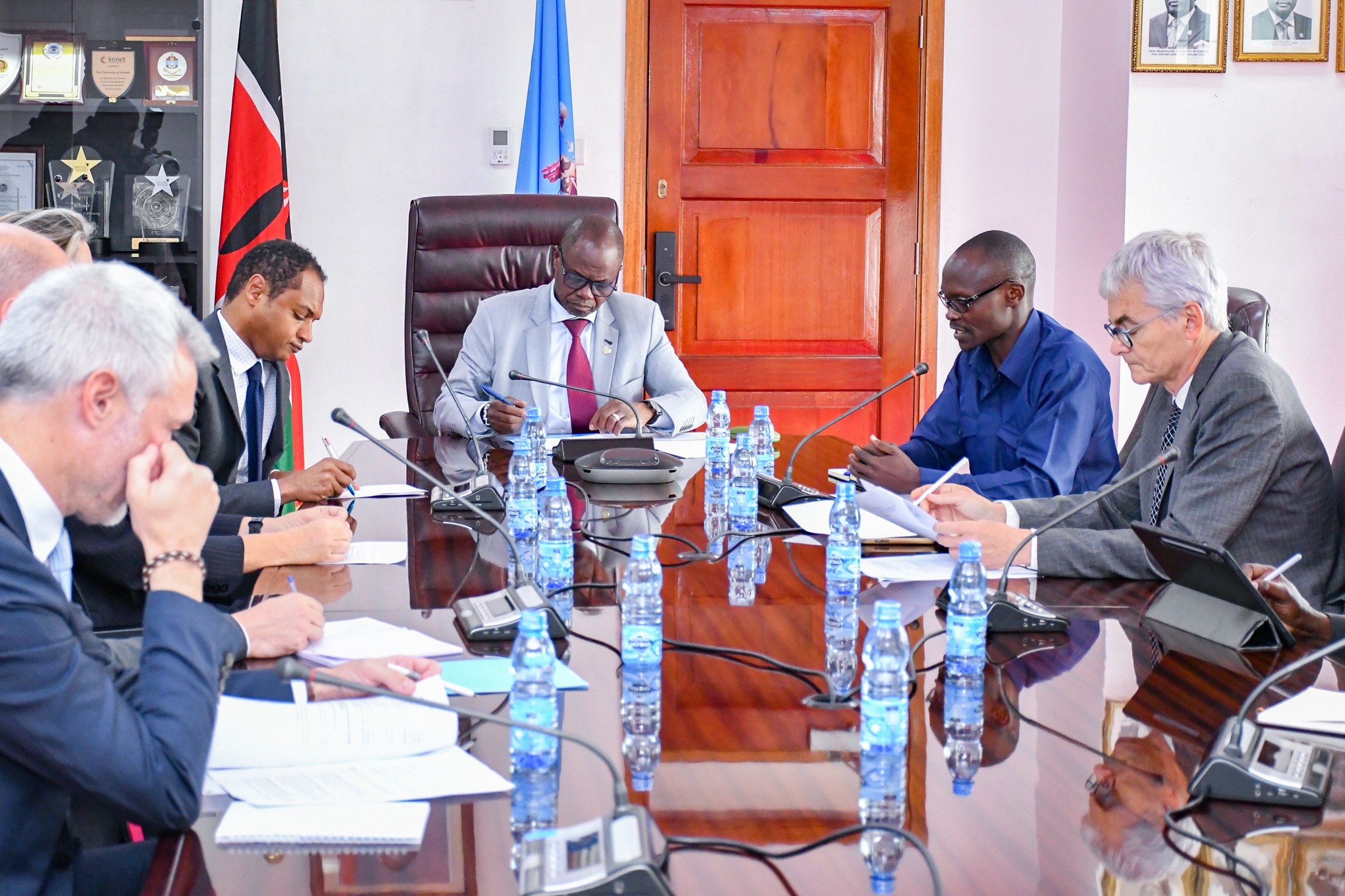 Director, University Advancement gives his brief during the courtesy call by the French Ambassador