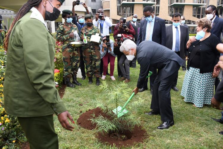 The chief Guest Indian Minister for External Affairs Dr. S. Jaishankar plants a tree during the ahead of the commissioning of the Mahatma Gandhi Graduate Library.
