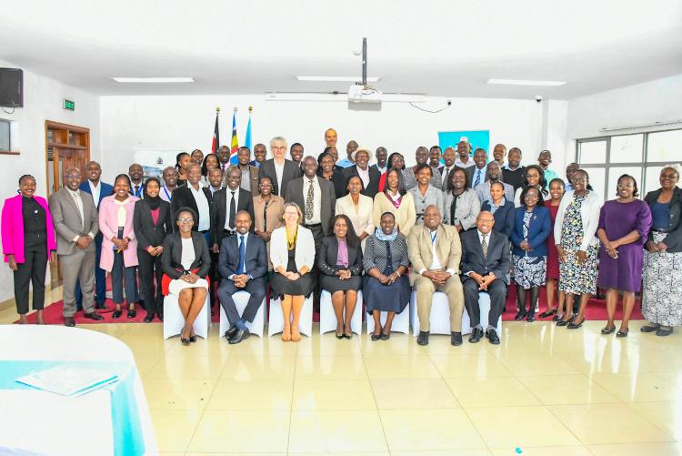 Principle Secretary, Dr Beatrice Inyangala joins members of the ESC project after the review